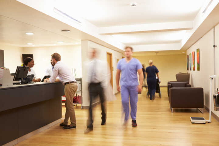 Reception desk at a busy hospital